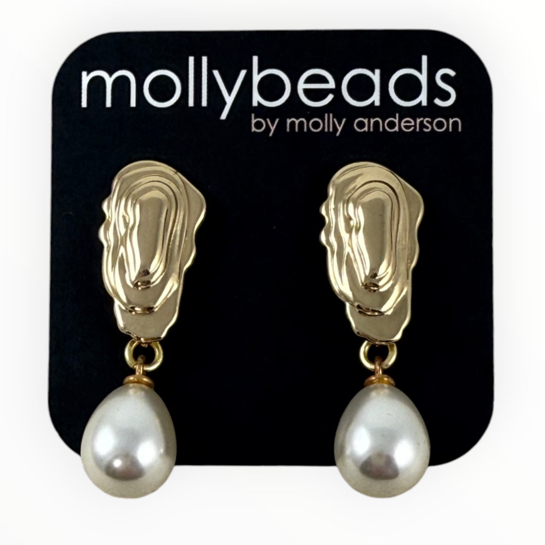 Gold oyster shell earrings with pearl drops